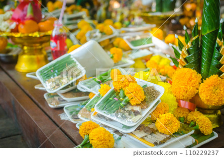 Buddhist religious offerings, Marigold, in thailand temple 110229237