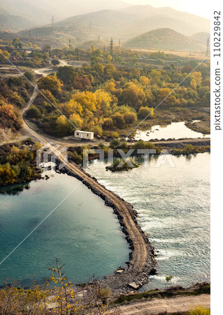 view of Rioni river and Mtskheta with mountains on the backgroun 110229842