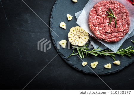 Raw cutlet for homemade burger 110230177