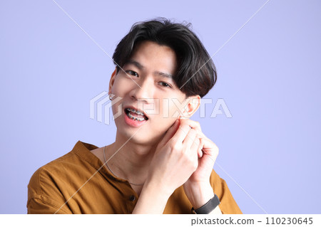 Man with Braces 110230645