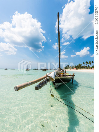 boat anchored on the African shore 110230764