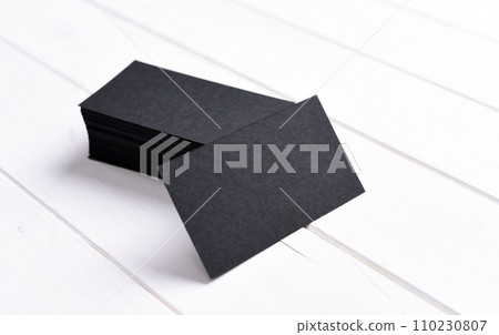 stacks of black business cards stacks of black business cards 110230807