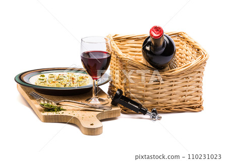 wine and cheese snack on wooden planch 110231023