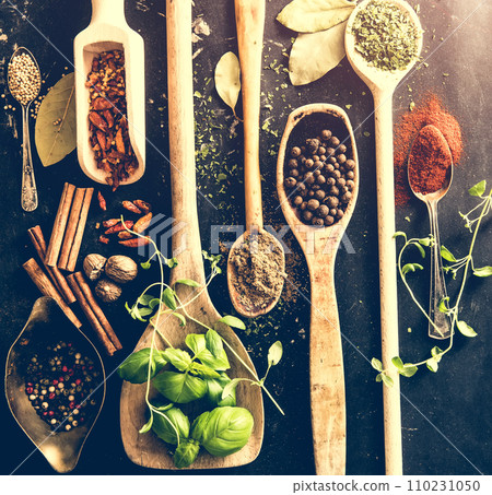 wooden spoons with spices and herbs wooden spoons with spices and herbs 110231050