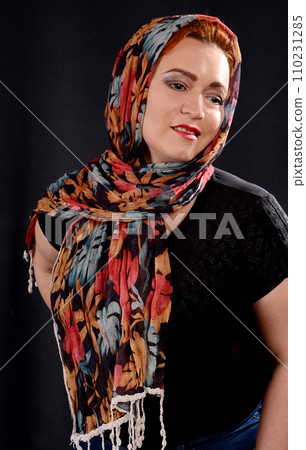 Young woman in a red scarf 110231285