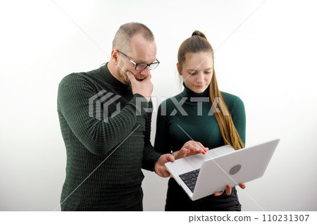 business couple on laptop computer surprise close rock another man with glasses horror incomprehensible experience 110231307
