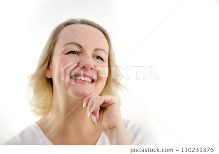 happy beautiful woman smiling and standing isolated on white background girl with perfect smile looking right Beautiful female smile after teeth whitening procedure. Dental care. Dentistry concept. 110231376