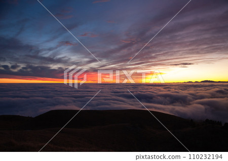 Spectacular sunset over a sea of clouds Spectacular sunset over a sea of clouds 110232194