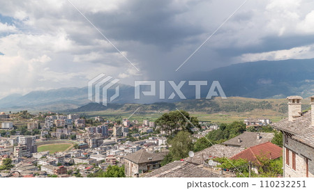Panorama showing Gjirokastra city from the viewpoint with many typical hystoric houses of Gjirokaster timelapse. 110232251