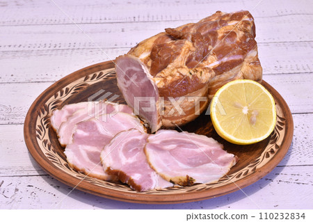 Pork meat roll on a plate. Pork meat roll on a plate. 110232834