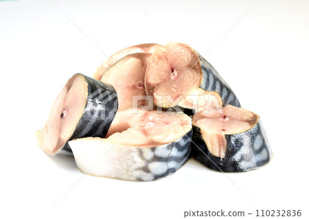 Fresh pieces of mackerel fish lie on the table. 110232836