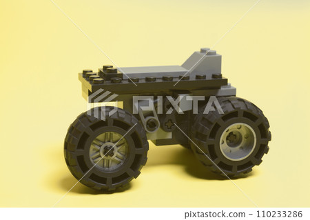 toy car on a yellow background toy car on a yellow background 110233286