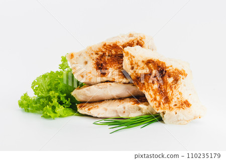 Chicken fillets fried until half cooked, semi-finished product with fresh herbs on a white background. Fast food. Quick cooking at home. Copy space.Fast cooking.Fast homemade food. Chicken fillets fried until half cooked, semi-finished product with fresh herbs on a white background. Fast food. Quick cooking at home. Copy space.Fast cooking.Fast homemade food. 110235179