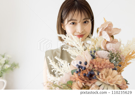 Woman with a bouquet 110235629