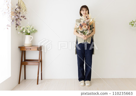 Woman with a bouquet 110235663