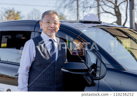 Middle-aged male taxi driver 110236252