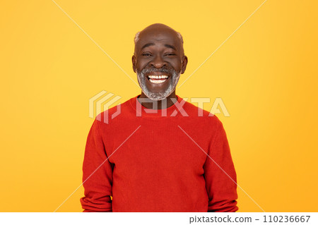 Radiant senior Black man with a white beard, sporting a red sweater and a beaming smile Radiant senior Black man with a white beard, sporting a red sweater and a beaming smile 110236667