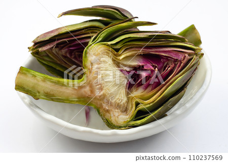 Fresh artichoke on white background. Fresh artichoke on white background. 110237569