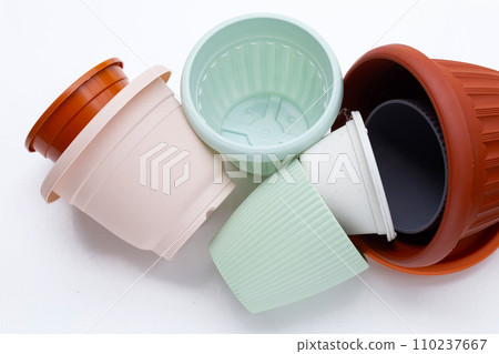 Plastic plant pots, containers on white background. 110237667