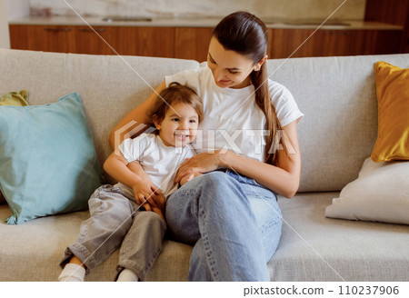 Happy Family Of Two Mom And Female Child Bonding Together At Home Happy Family Of Two Mom And Female Child Bonding Together At Home 110237906