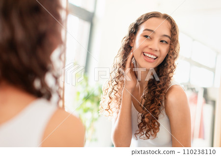 Happy Teen Girl Touching Smooth Face Skin At Home Happy Teen Girl Touching Smooth Face Skin At Home 110238110
