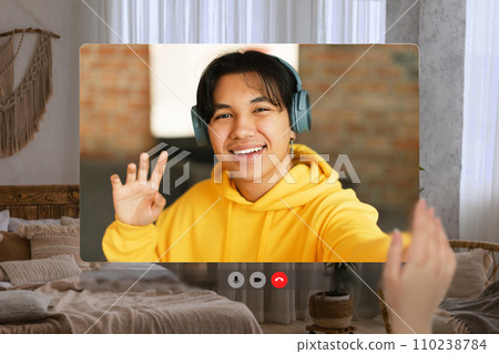 Pov screen of asian teen guy having video call indoors 110238784