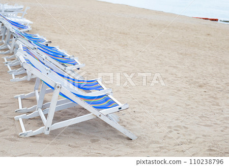Chairs on the sandy beach Chairs on the sandy beach 110238796