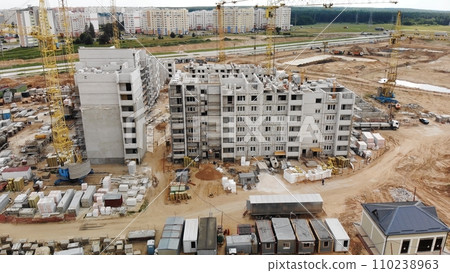 Construction of apartment buildings in Belarus. Drone view. Construction of apartment buildings in Belarus. Drone view. 110238963