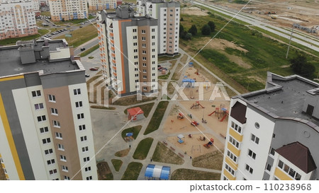 A new recently built neighborhood of apartment buildings. Drone video. 110238968