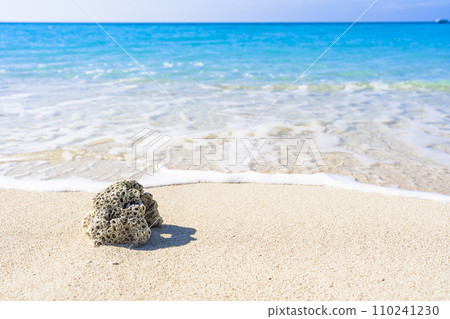White sand beach and blue sea of Busena Marine Park, washed up coral, Nago City, Okinawa Prefecture White sand beach and blue sea of Busena Marine Park, washed up coral, Nago City, Okinawa Prefecture 110241230