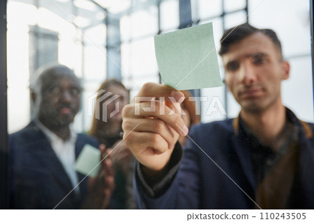 Young happy multiethnic diverse young professional creative team group students talking brainstorming 110243505