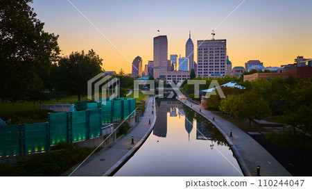 Aerial Sunrise Over Indianapolis Skyline and Reflective River 110244047