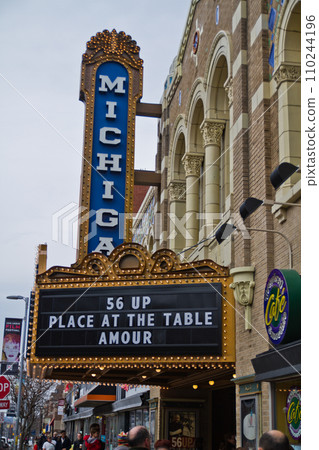 Vintage Michigan Theater Marquee in Bustling Urban Setting 110244196