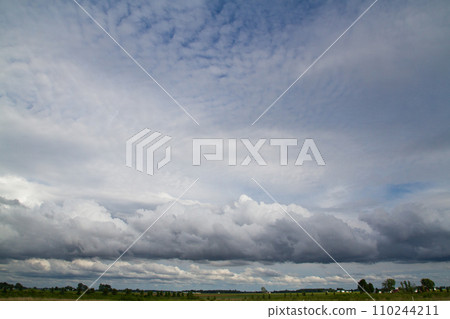 Dramatic Cumulus Clouds Over Serene Indiana Farmland Dramatic Cumulus Clouds Over Serene Indiana Farmland 110244211