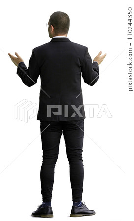 young man in full growth. isolated on white background demonstrates with hands 110244350