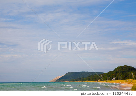 Daytime at Lake Michigan, Coastal Landscape with Turquoise Sea and Hills 110244453
