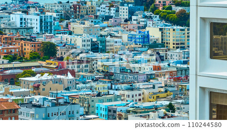 Residential city apartment aerial beside square window San Francisco skyscraper, CA 110244580