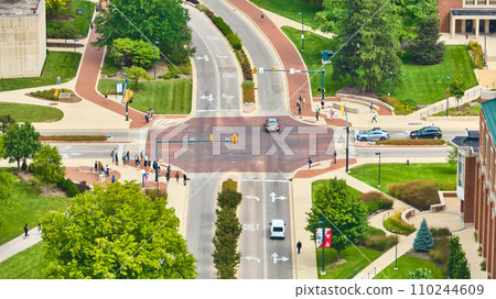 Students at Ball State University crossroad with pedestrians at intersection aerial, Muncie, IN Students at Ball State University crossroad with pedestrians at intersection aerial, Muncie, IN 110244609