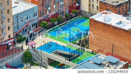 Willie Woo Woo Wong Playground with children and parents on courts surrounded by apartment buildings, San Francisco, CA Willie Woo Woo Wong Playground with children and parents on courts surrounded by apartment buildings, San Francisco, CA 110244659