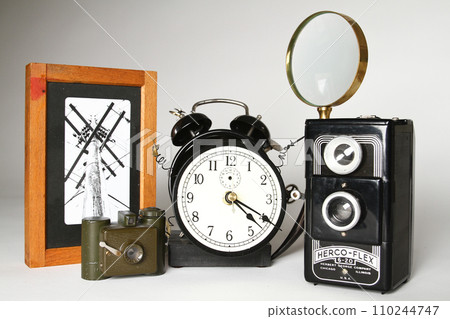 Vintage Time and Photography Still Life on Light Grey Background 110244747