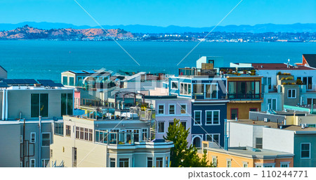 Sunny neighborhood overlooking San Francisco Bay water on sunny day aerial, CA Sunny neighborhood overlooking San Francisco Bay water on sunny day aerial, CA 110244771
