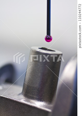 Magenta CMM Programming Lab Probe Approaching Part for Inspection Close-Up Magenta CMM Programming Lab Probe Approaching Part for Inspection Close-Up 110244772