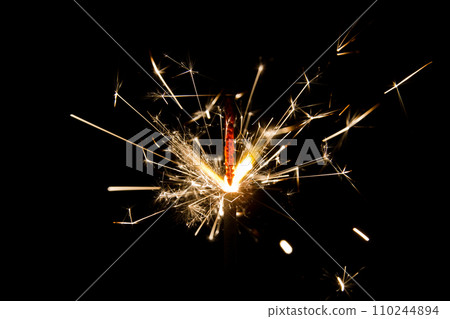 Vibrant Sparkler Display in Dark Background 110244894