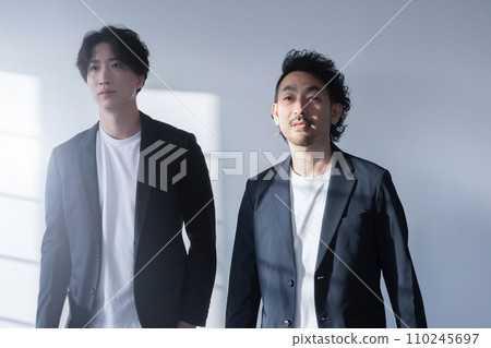 An irritated busy businessman walking in a hurry towards his goal 110245697