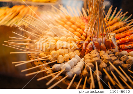 Skewers of streetfood on a table in Thailand,Steamed hot dogs Skewers of streetfood on a table in Thailand,Steamed hot dogs 110246650
