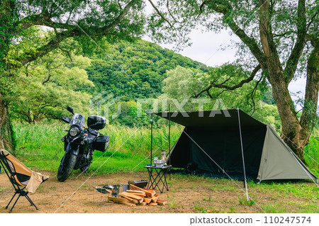 Solo camping on a bike 110247574