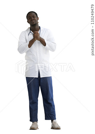 A male doctor, on a white background, in full height, pleads 110249479