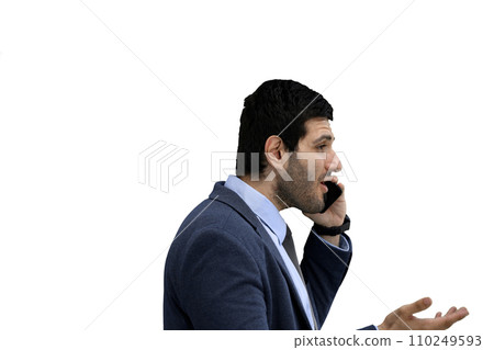 Close-up of a man in an office suit on a White background talking on the phone, in profile Close-up of a man in an office suit on a White background talking on the phone, in profile 110249593
