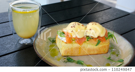 Eggs Benedict- toasted English muffins, poached eggs, and delicious buttery hollandaise sauce 110249847