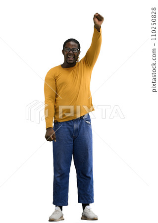 A man in a yellow jacket on White background raised his hand up 110250828